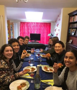 Young people eat insects at a home based restaurant